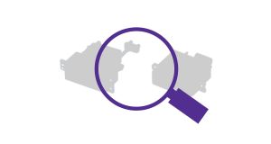 インクジェットヘッドを虫眼鏡で調べるイメージ画像